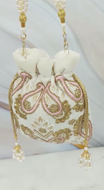 Rosal designer potli