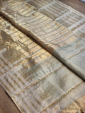 Handwoven tissue striped saree