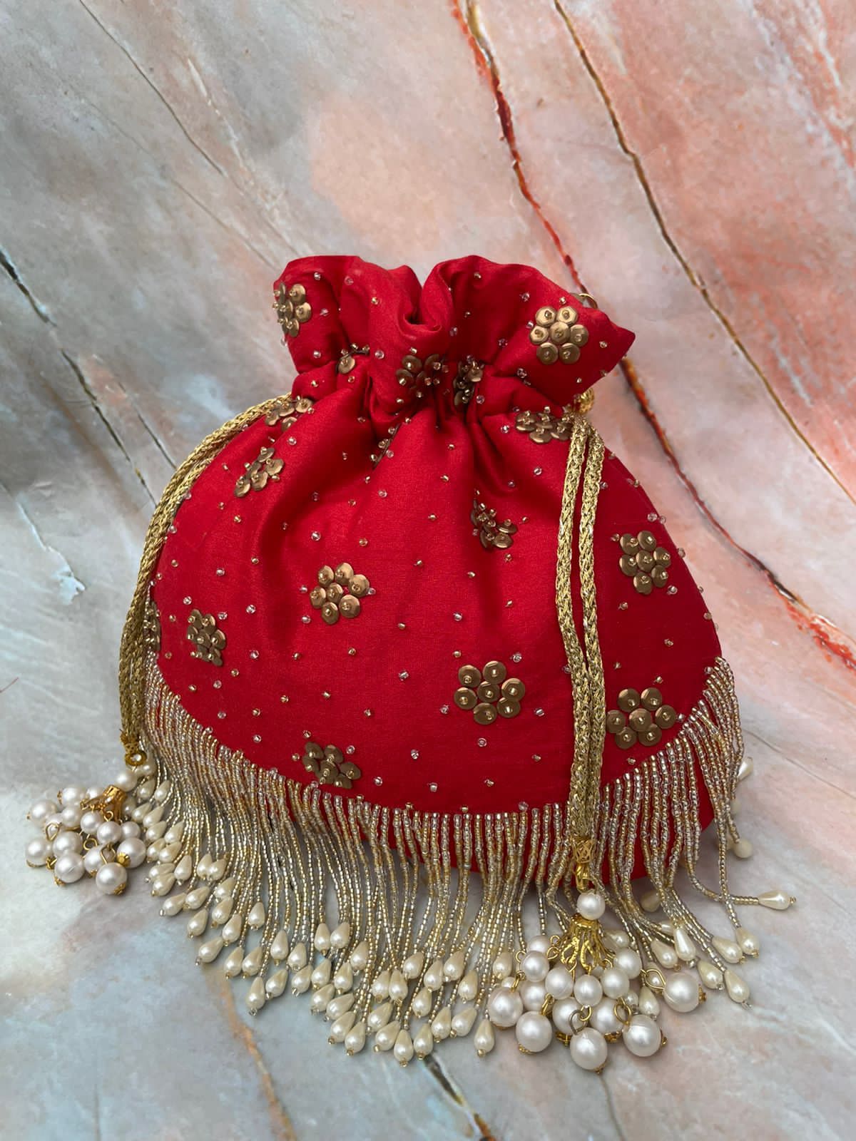 Laldli red potli - Saffronfashionindia