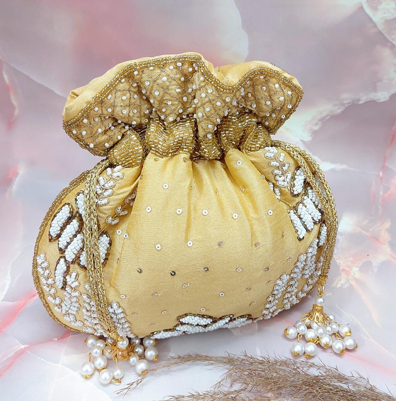 Wallah embroidered potlis - Saffronfashionindia