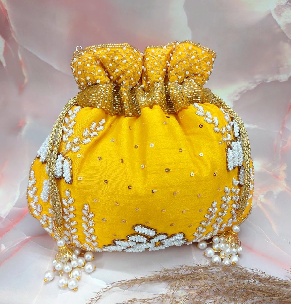 Wallah embroidered potlis - Saffronfashionindia