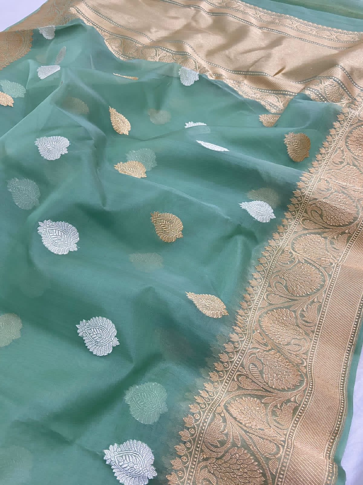 Banarasi kora silk saree with antique zari blouse. – Meshira