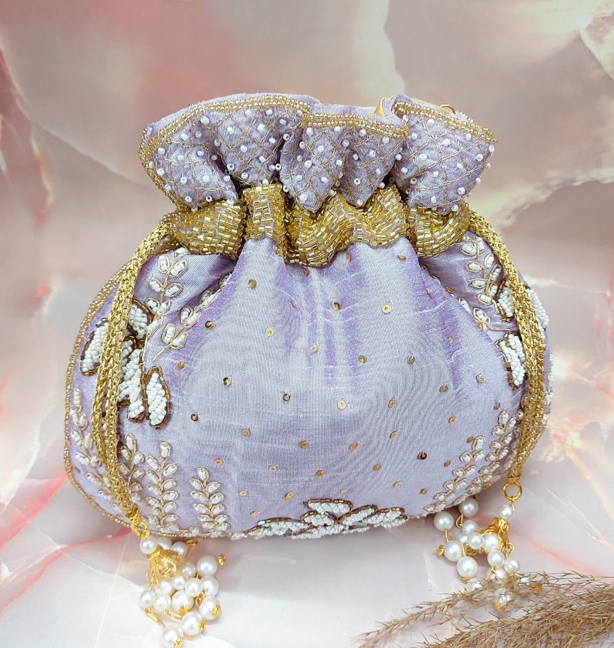 Wallah embroidered potlis - Saffronfashionindia