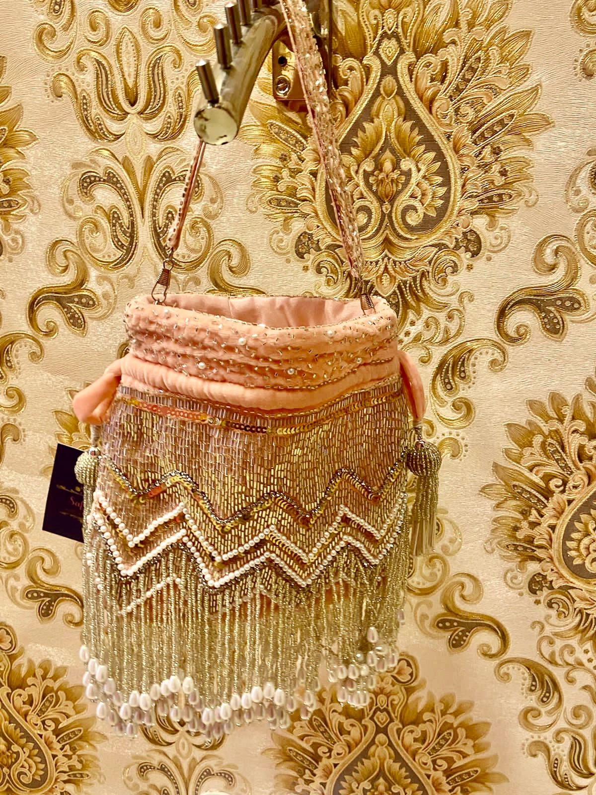 Sequins pink pearl potli - Saffronfashionindia