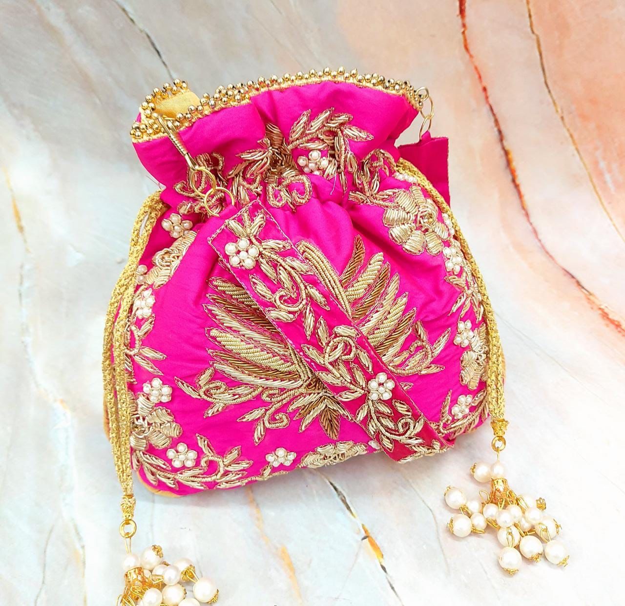 Malvika zardosi potlis - Saffronfashionindia