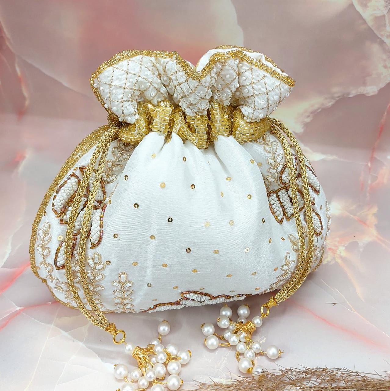 Wallah embroidered potlis - Saffronfashionindia