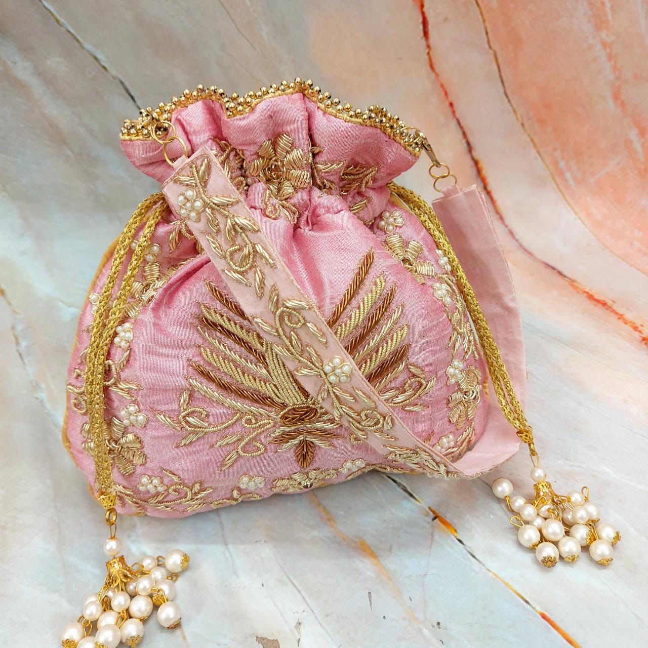 Malvika zardosi potlis - Saffronfashionindia