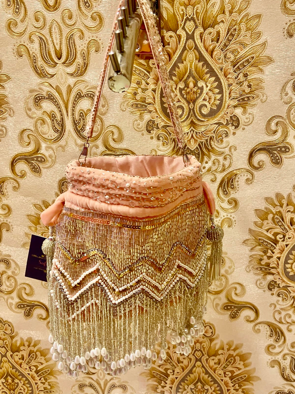 Sequins pink pearl potli - Saffronfashionindia