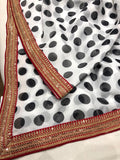 Zardosi bordered polka dot saree